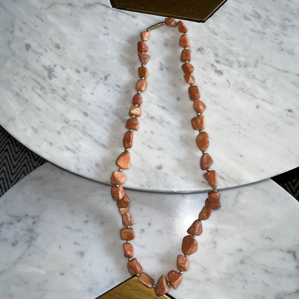 Artisnal 26" peach/pink natural stone necklace.